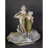 EARLY TWENTIETH CENTURY ROYAL DUX (BOHEMIA) PORCELAIN FIGURAL SHALLOW WATER RECEIVING BOWL in the