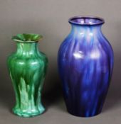 TWO PILKINGTONS POTTERY VASE WITH CURDLED GLAZES, one of ovoid form in purple, 10” (25.4cm) high,