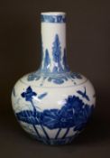 MODERN CHINESE BLUE AND WHITE PORCELAIN VASE, of bottle form, painted with birds and winged