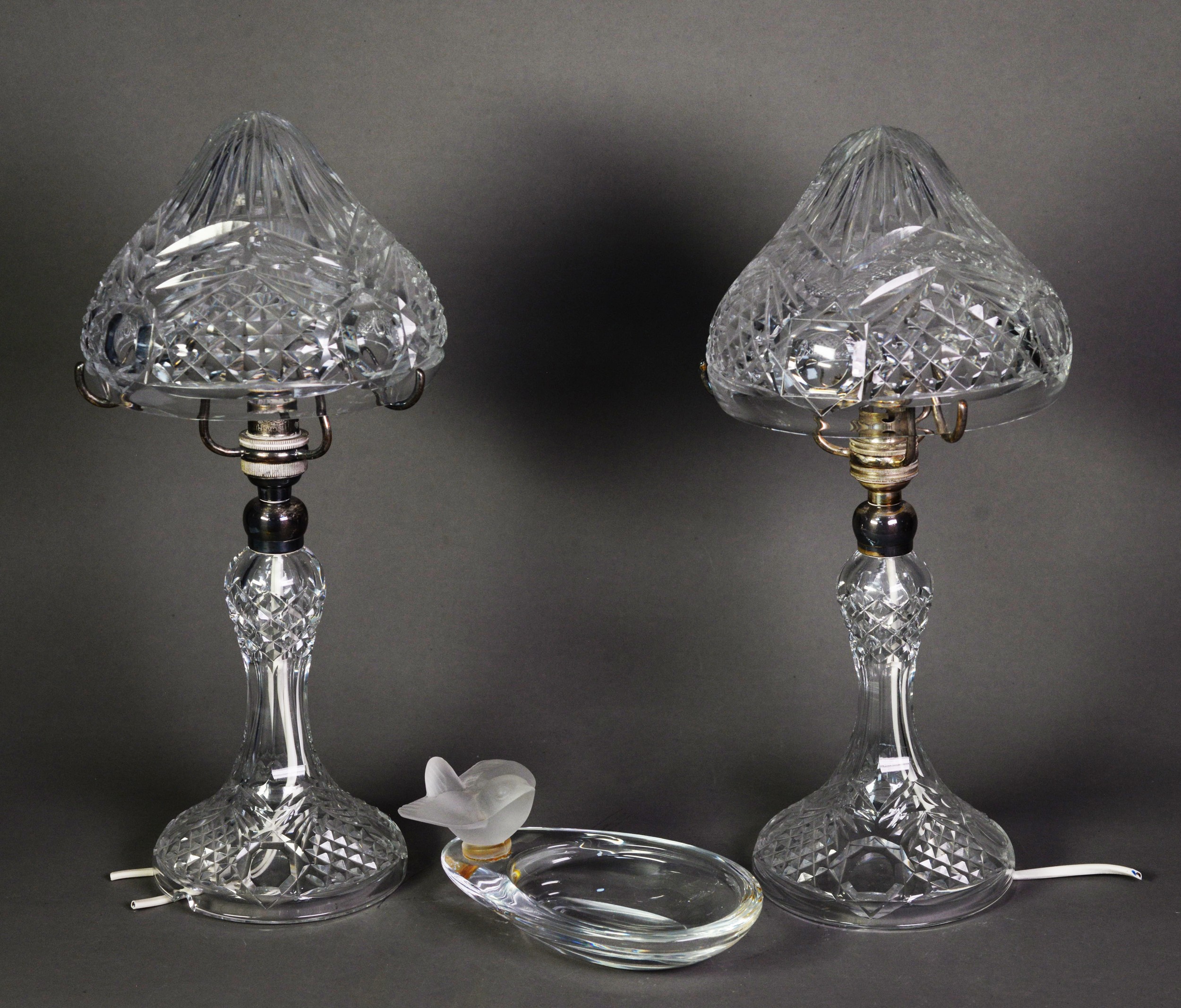 PAIR OF CUT GLASS TABLE LAMPS, each with baluster column, spreading foot, pointed shade and