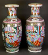 LARGE PAIR OF MODERN CHINESE FAMILLE ROSE PORCELAIN VASES, each of rouleau form, painted in
