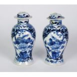 PAIR OF CHINESE BLUE AND WHITE PORCELAIN SMALL VASES AND COVER, each of baluster form with domes