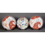 PAIR OF IMARI PORCELAIN PLAQUES, each painted with a phoenix and decorated red reserves, 9 1/2" (