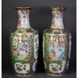 PAIR OF CHINESE LATE QING DYNASTY CANTON DECORATED VASES, the oviform bodies beneath waisted