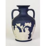 WEDGWOOD BLUE JASPERWARE POTTERY PORTLAND VASE, sprigged in white, 6” (15.2cm) high, impressed