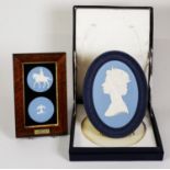 TWO BOXED WEDGWOOD BLUE JASPERWARE QUEEN ELIZABETH II SILVER JUBILEE COMMEMORATIVE MEDALLIONS, one