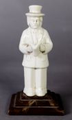 CHINESE BLANC DE CHINE PORCELAIN FIGURE OF ABRAHAM LINCOLN, standing reading a book, 6in (15.2cm)