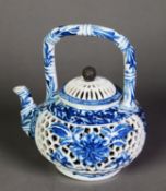 TWENTIETH CENTURY ORIENTAL RETICULATED BLUE AND WHITE PORCELAIN TEA KETTLE AND COVER, of footed form