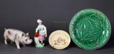 A DERBY CHINA FEMALE FIGURE, STANDING BY A WATER FOUNTAIN, with a watering can, 5" (13cm) high, (CR;