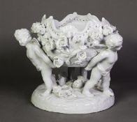 LATE NINETEENTH/EARLY TWENTIETH CENTURY CONTINENTAL PORCELAIN WHITE GLAZED pierced and floral