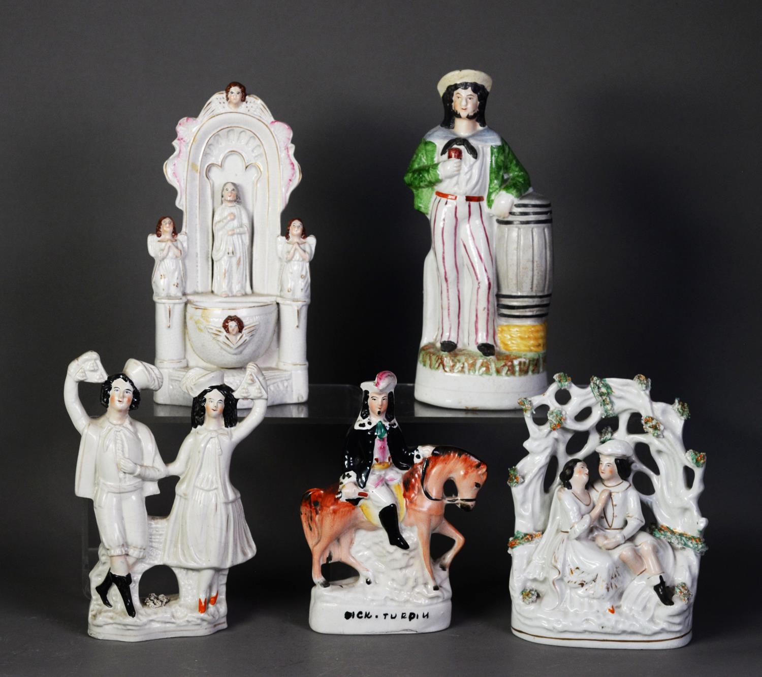 FIVE NINETEENTH CENTURY STAFFORDSHIRE FLAT BACK POTTERY FIGURES OR GROUPS, comprising: RELIGIOUS