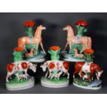 PAIR OF NINETEENTH CENTURY STAFFORDSHIRE FLAT BACK POTTERY SPILL VASE GROUPS, each painted in