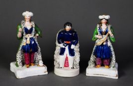 THREE NINETEENTH CENTURY STAFFORDSHIRE POTTERY FIGURES WITH SHREDDED CLAY DETAIL, comprising: A