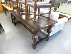 A 1930's JACOBETHAN FOUR PILLAR REFECTORY DINING TABLE, HAVING LARGE BULBOUS SUPPORTS (198cm long