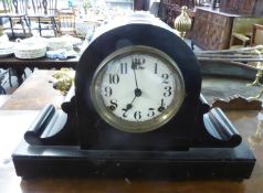 A NAPOLEON HAT SHAPED BLACK-WOOD MANTEL CLOCK WITH THREE TRAIN MOVEMENT