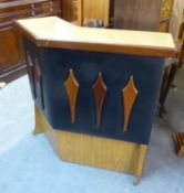 A VINTAGE FREE STANDING BAR, IN FORMICA WOOD AND FAUX BLACK LEATHER