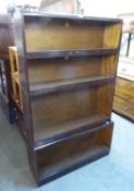 A SIMPLEX FOUR TIER SECTIONAL BOOKCASE, LACKING GLASS DOORS (A.F.)