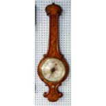 VICTORIAN FIGURED WALNUT BANJO BAROMETER, with 10” silvered dial, in an arch topped case with