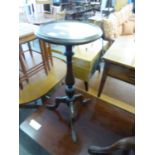 A GEORGE V MAHOGANY TRIPOD CIRCULAR TOP WINE TABLE