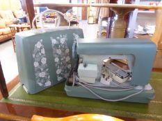 AN ELECTRIC PORTABLE SEWING MACHINE