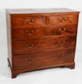 GEORGE III MAHOGANY CHEST OF DRAWERS, the moulded oblong top above two short and three long,