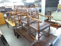 A SET OF FOUR GOTHIC OAK CARVER CHAIRS WITH STUFF-OVER SEATS