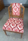 A VICTORIAN RED WALNUT PRIE DIEU STYLE CHAIR WITH INTRICATE CARVING TO THE BACK