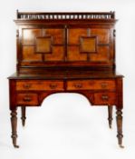 VICTORIAN AESTHETICS MOVEMENT OAK AND WALNUT CLERKS DESK, the galleried oblong top above a large,