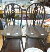 PAIR OF CHILD'S ELM SEATED WHEEL-BACK DINING CHAIRS