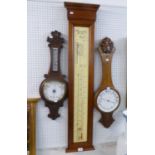 A REPRODUCTION FITZROY STYLE BAROMETER AND TWO BANJO SHAPED BAROMETERS (A.F.) (3)