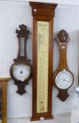 A REPRODUCTION FITZROY STYLE BAROMETER AND TWO BANJO SHAPED BAROMETERS (A.F.) (3)