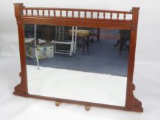 LATE VICTORIAN/ EDWARDIAN CARVED WALNUT FRAMED OVERMANTLE MIRROR, the oblong plate within a