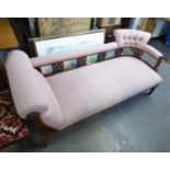 A VICTORIAN RED WALNUT CHAISE LONGUE, HAVING UPHOLSTERED HEAD REST, BACK AND SEAT IN PINK FABRIC