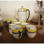 A 15 PIECE 1930's FOLEY CHINA COFFEE SERVICE IN YELLOW AND BLACK