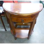A SMALL MAHOGANY DEMI-LUNE HALL TABLE, WITH DRAWER AND UNDERSHELF