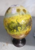 A PRINTED OSTRICH EGG, DECORATED WITH ELEPHANTS