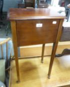 AN EDWARDIAN MAHOGANY OBLONG SEWING TABLE, WITH HINGED LID, ON SQUARE TAPERING LEGS