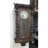 A VIENNA STYLE, MAHOGANY CASED WALL CLOCK, HAVING WHITE DIAL WITH ROMAN NUMERALS (A.F.)