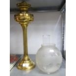 INTER-WAR YEARS BRASS COLUMNAR OIL LAMP with frosted glass shade and funnel, 25 ½" (65cm) high