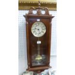 A MODERN HERMLE WALL CLOCK IN MAHOGANY FRAME