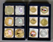 TWELVE PROOF METAL COMMEMORATIVE COINS, mostly gold plated, some also printed in colours, various