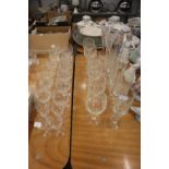 GOOD SELECTION OF CUT GLASS DRINKING GLASSES VARIOUS TO INCLUDE; TWO TALL CHAMPAGNE FLUTES, 5