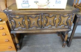 JACOBEAN STYLE OAK CARVED DRESSER, HAVING TWO DEEP DRAWERS