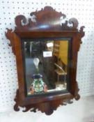 AN ANTIQUE MAHOGANY CHIPPENDALE STYLE FRET CARVED WALL MIRROR