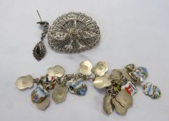 CONTINENTAL SILVER COLOURED METAL (800 Standard) CHARM BRACELET, with 18 ENAMELLED SILVER small town