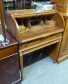 A POST WAR REPRODUCTION MAHOGANY CYLINDER DESK, HAVING SINGLE DRAWER ON SQUARE TAPERING LEGS