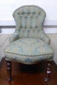 ANTIQUE NURSING CHAIR, BUTTONED BACK AND FULLY UPHOLSTERED ON TURNED FRONT SUPPORTS