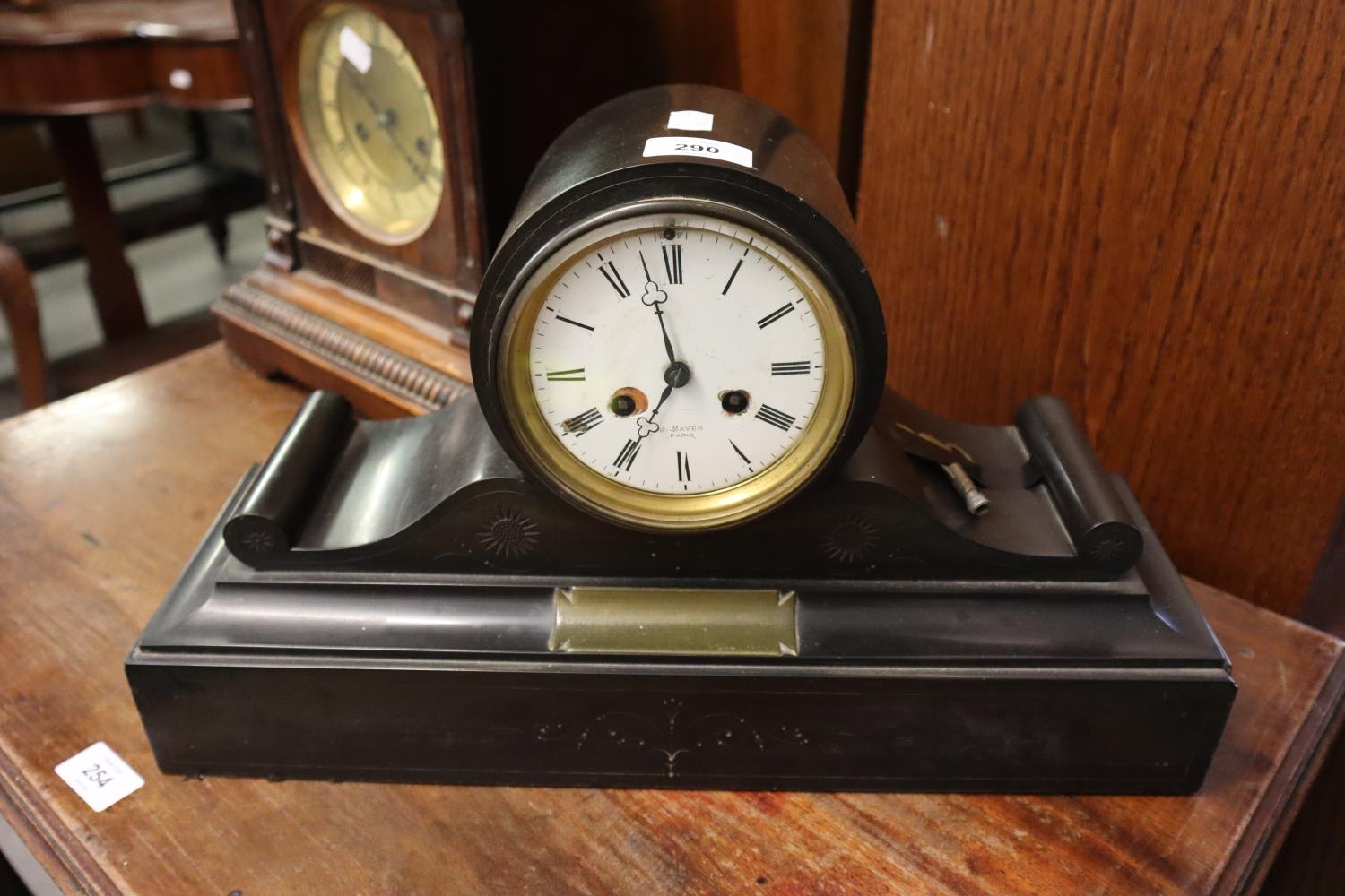 A BLACK SLATE DRUM MANTEL CLOCK (A.F.)