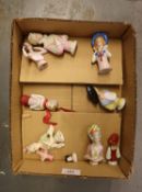 NINE CHINA HALF DOLLS, and a MINIATURE PORCELAIN DOLL’S HEAD AND SHOULDERS, (10)