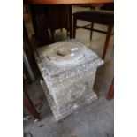 COMPOSITE STONE PLINTH, WITH CARVED GARLAND DECORATION 16" (42cm) high x 13 1/2" (34cm) square